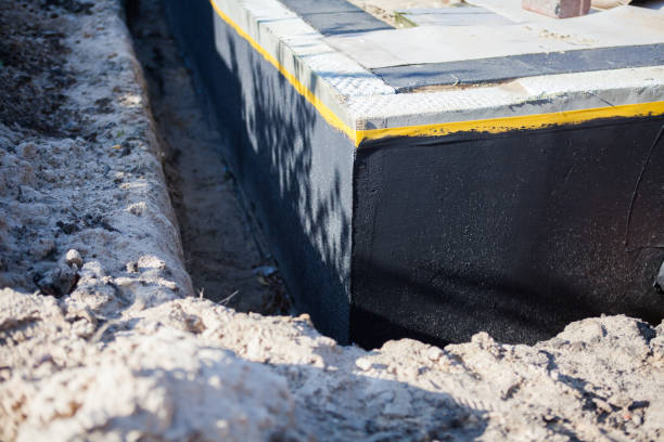 Professional Emergency Waterproofing technician working in Kingsford Heights, IN